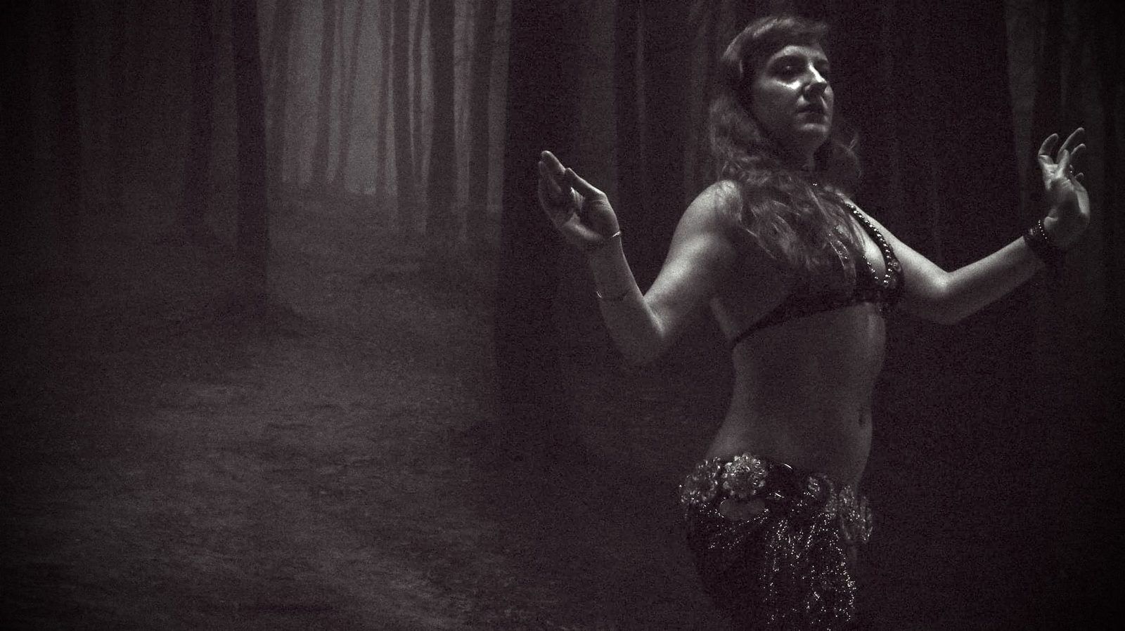 Amalphia Sylva dancing in a misty forest scene